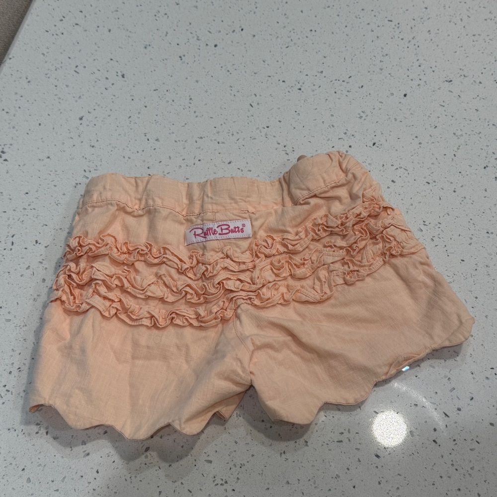 Ruffle Butts Coral Ruffle Shorts